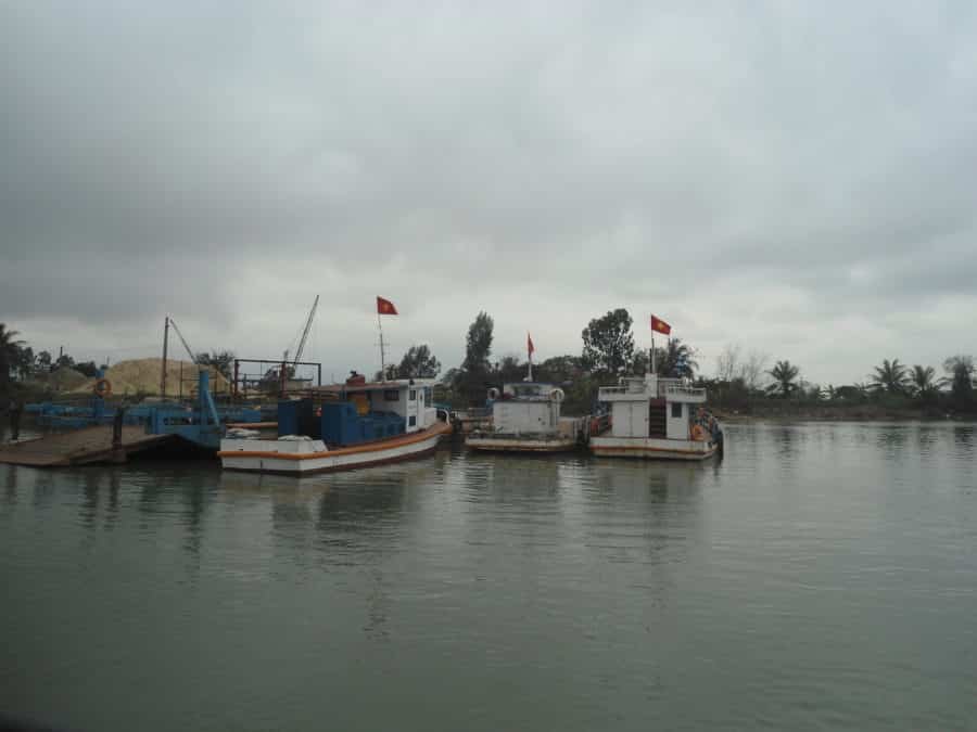 Boats floating in a river in Hai Phong