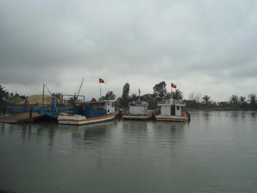 Boats floating in a river in Hai Phong