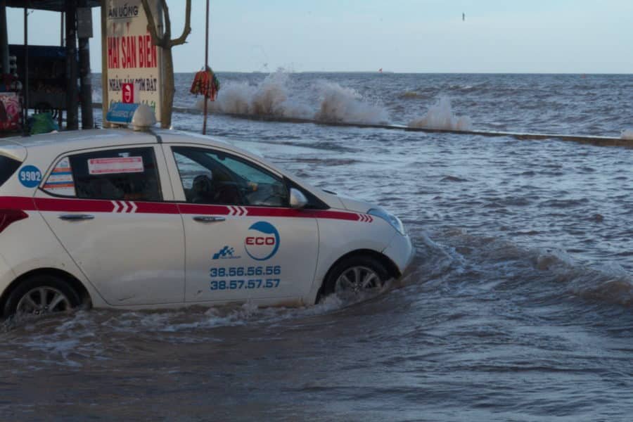 Taxi bogged in seawater and cant get out