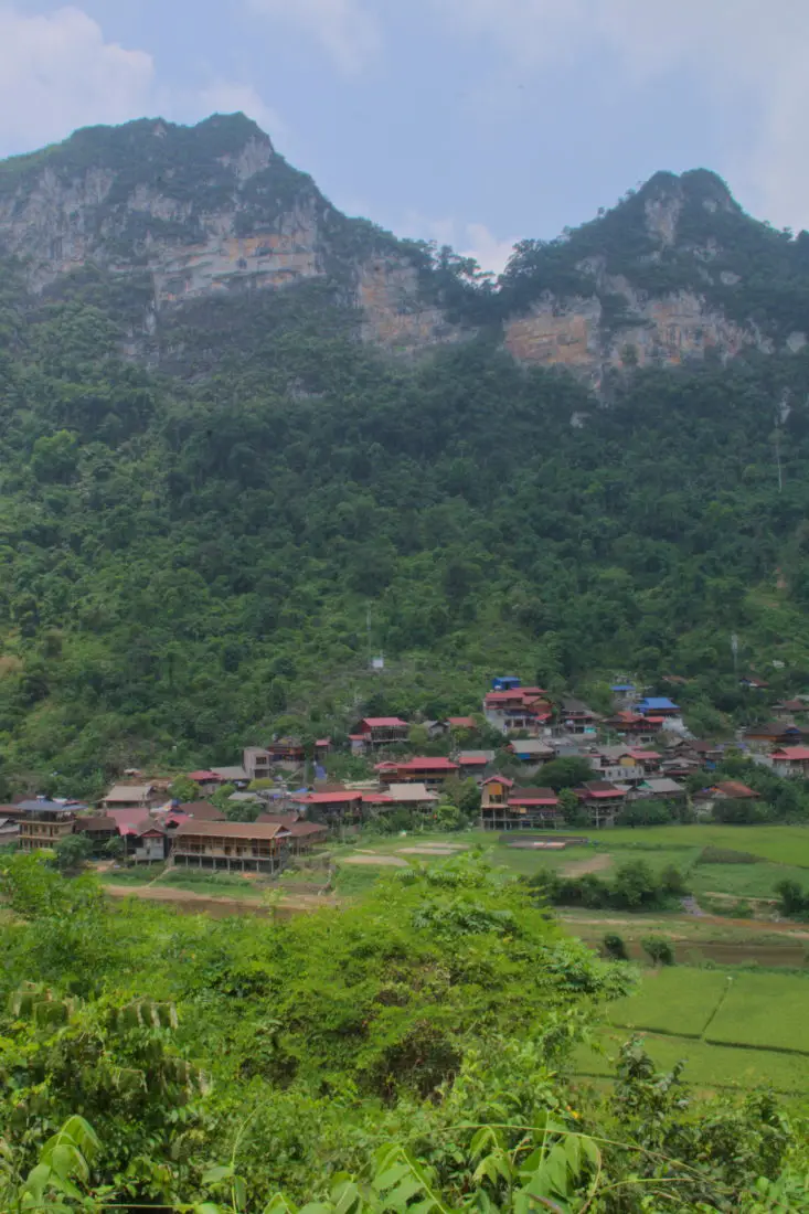 A Tay minority village nestled beneath a limestone mountain and jungle in Northern Bac Kan