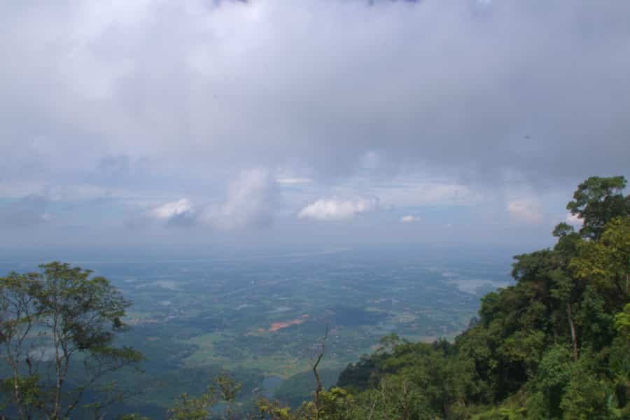 A view with the red river in the distance A mountain view from Ba Vi towards Hanoi with the Red River in the distance