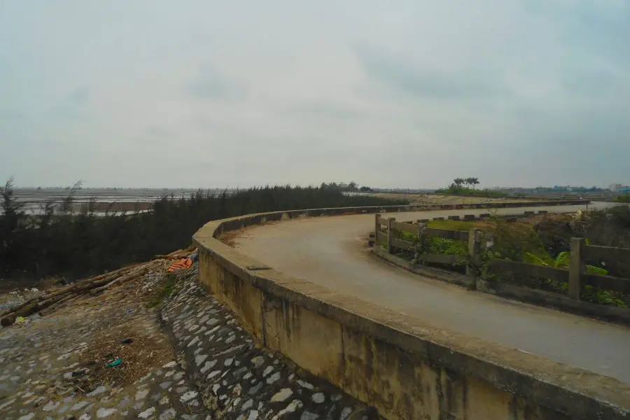 Cement levee roads on the way to Haiphong on a motorbike tour of Vietnam