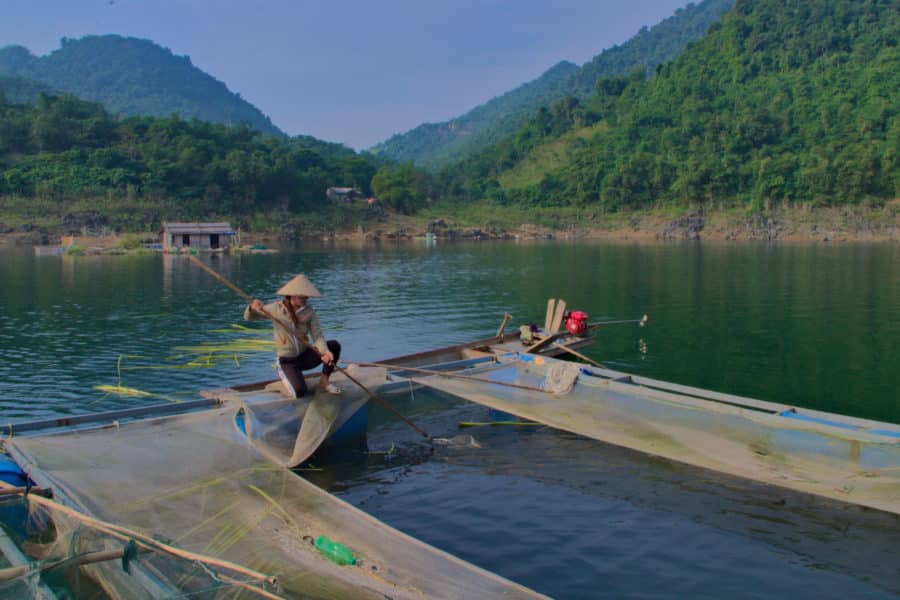 Vietnamese woman fish farming in Hoa Binh