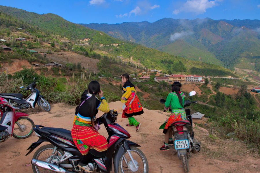 Muong minority girls on motorbikes in the Mountains of Vietnam