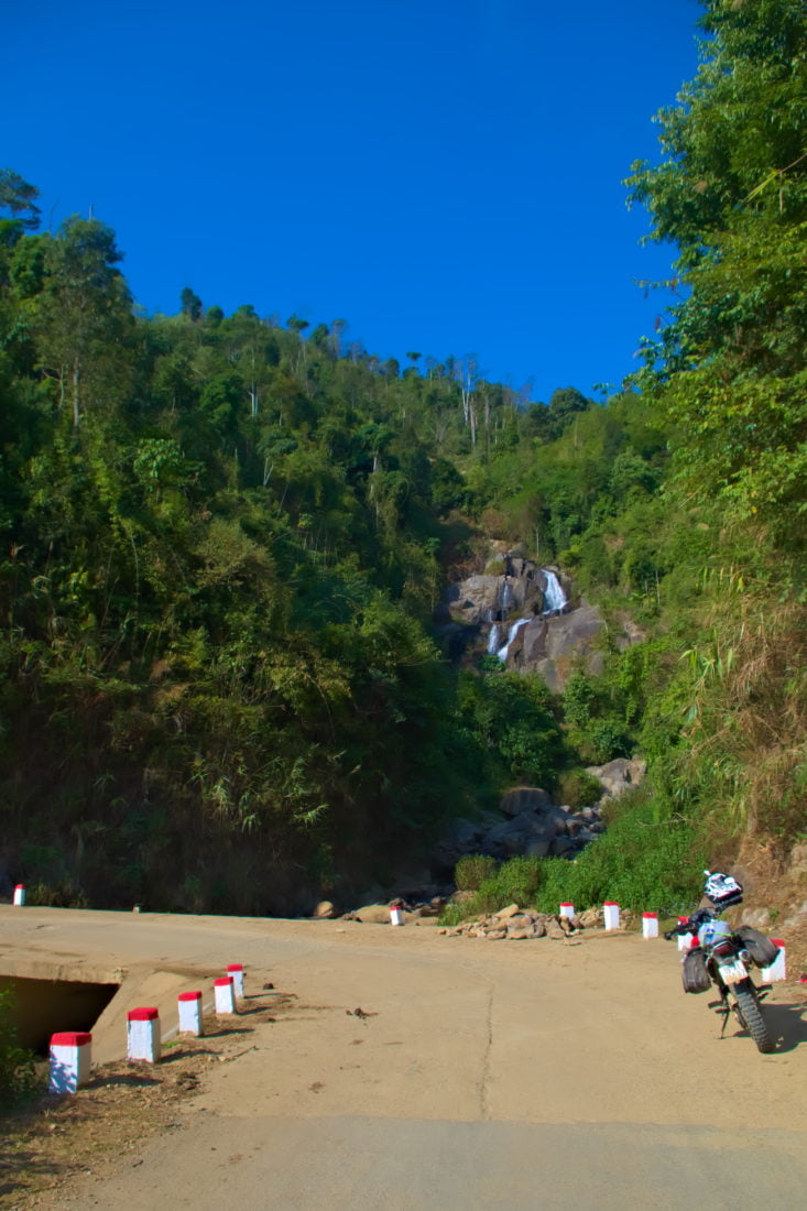 Roadside waterfall with a honda xr motorbike in Xin Vang, Son La