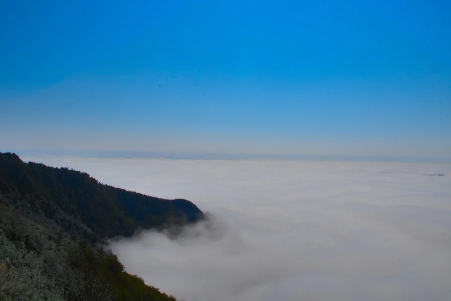above a sea of clouds at Ta Xua, Vietnam