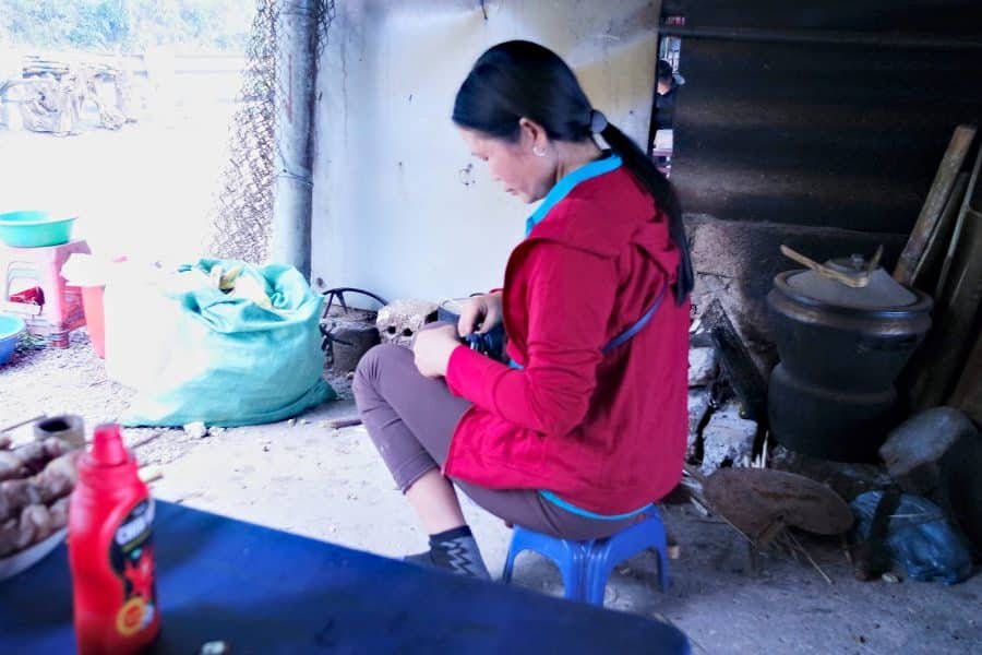 A Muong lady in a roadside kitchen in Vietnam