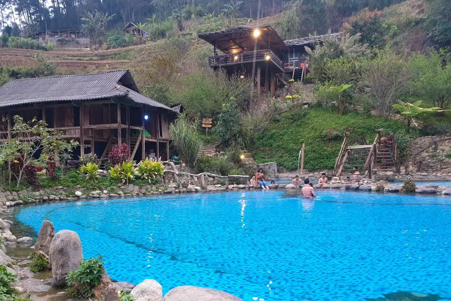 Hot springs next to stilt houses in Vietnam