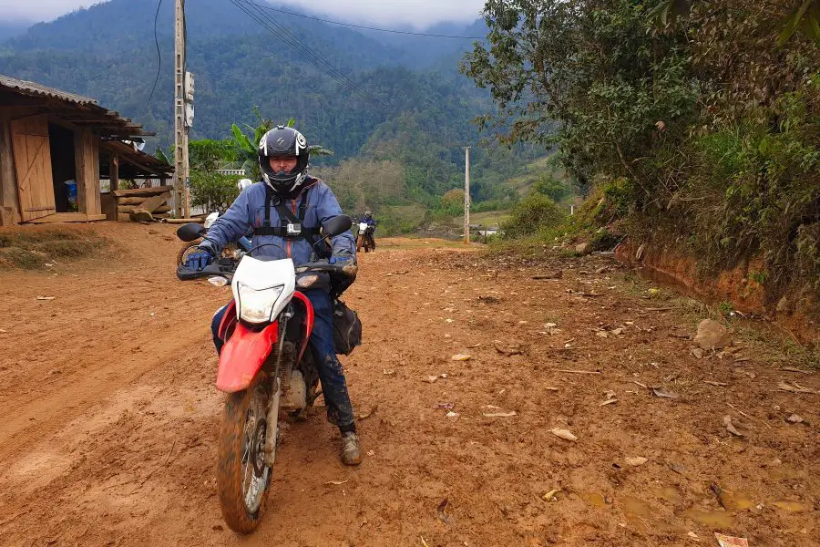 Motorbike rider on a red Honda XR 150