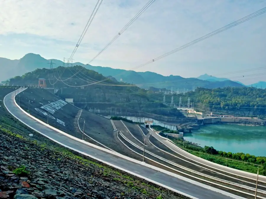 A side on view from the top of a dam wall on a Vietnamese river